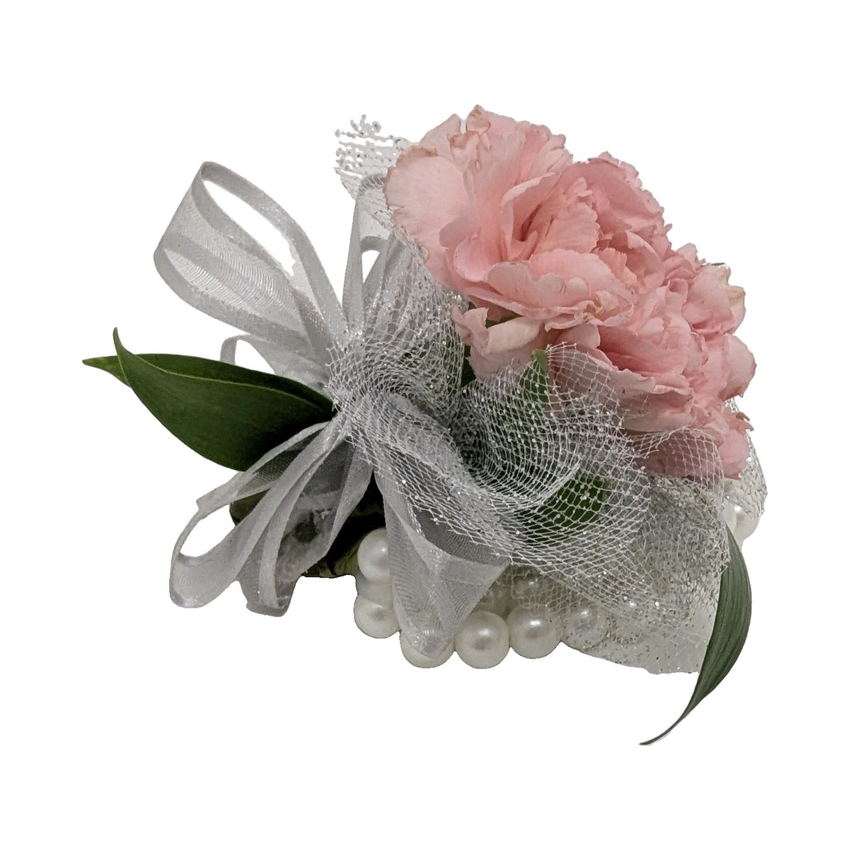Pink carnation corsage with silver ribbon on a white pearl wristband