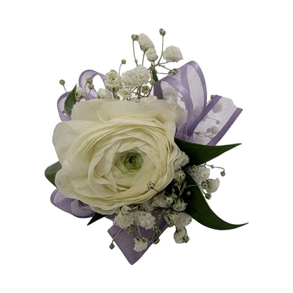 White ranunculus and baby's breath corsage with lavender ribbon