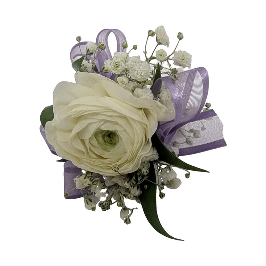 White ranunculus wrist corsage with lavender ribbon and baby's breath, made by Wes' Flowers in Temecula